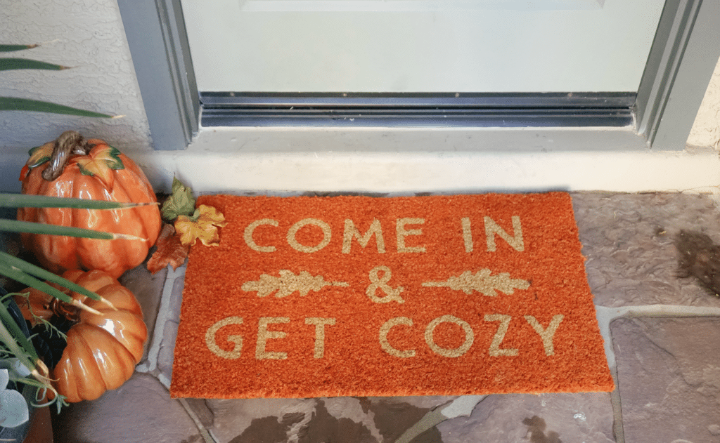 Welcome mat outside of short-term rental property